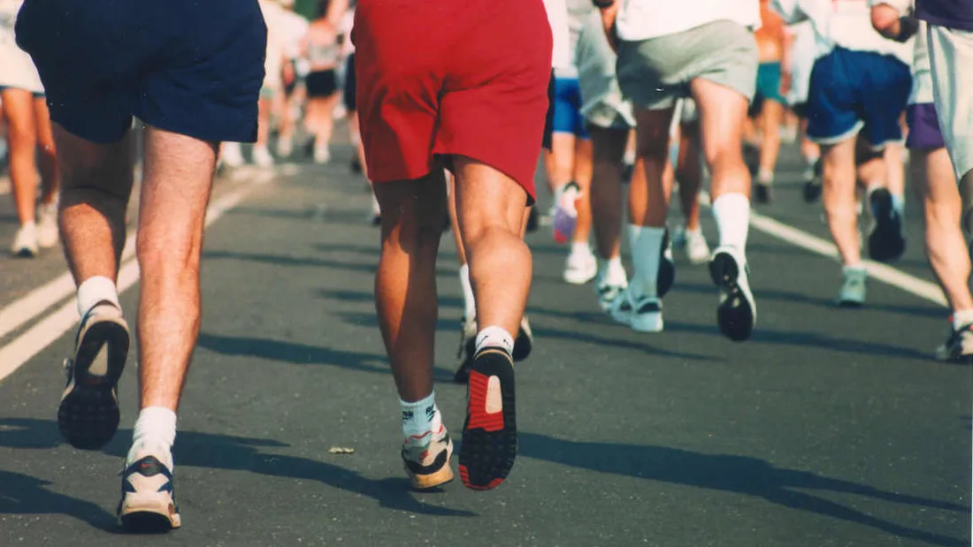 A runner stretching the back of the leg